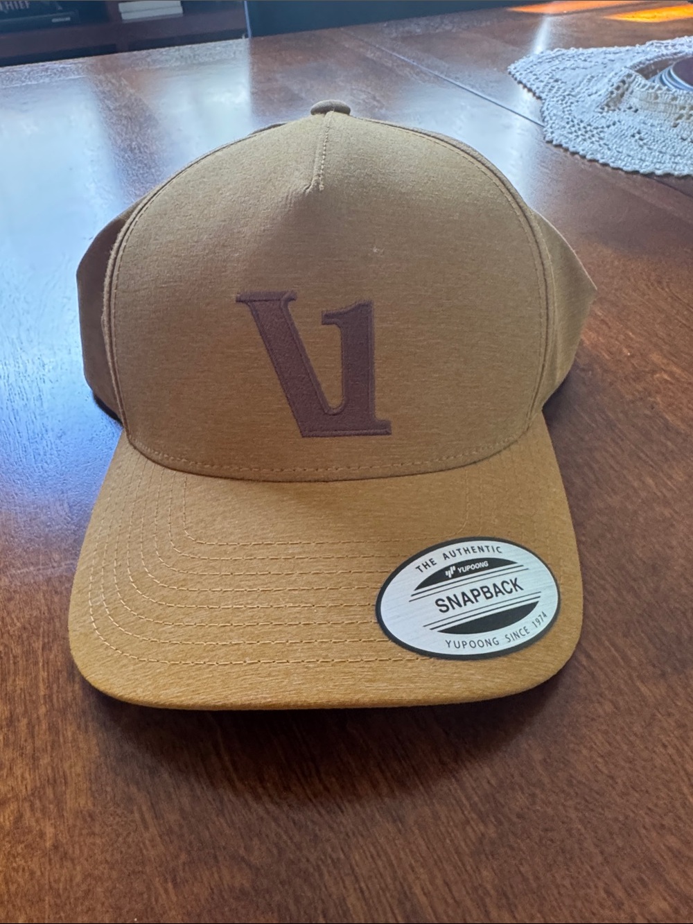 Vuori NWT Snapback Hat with Embroidered Logo